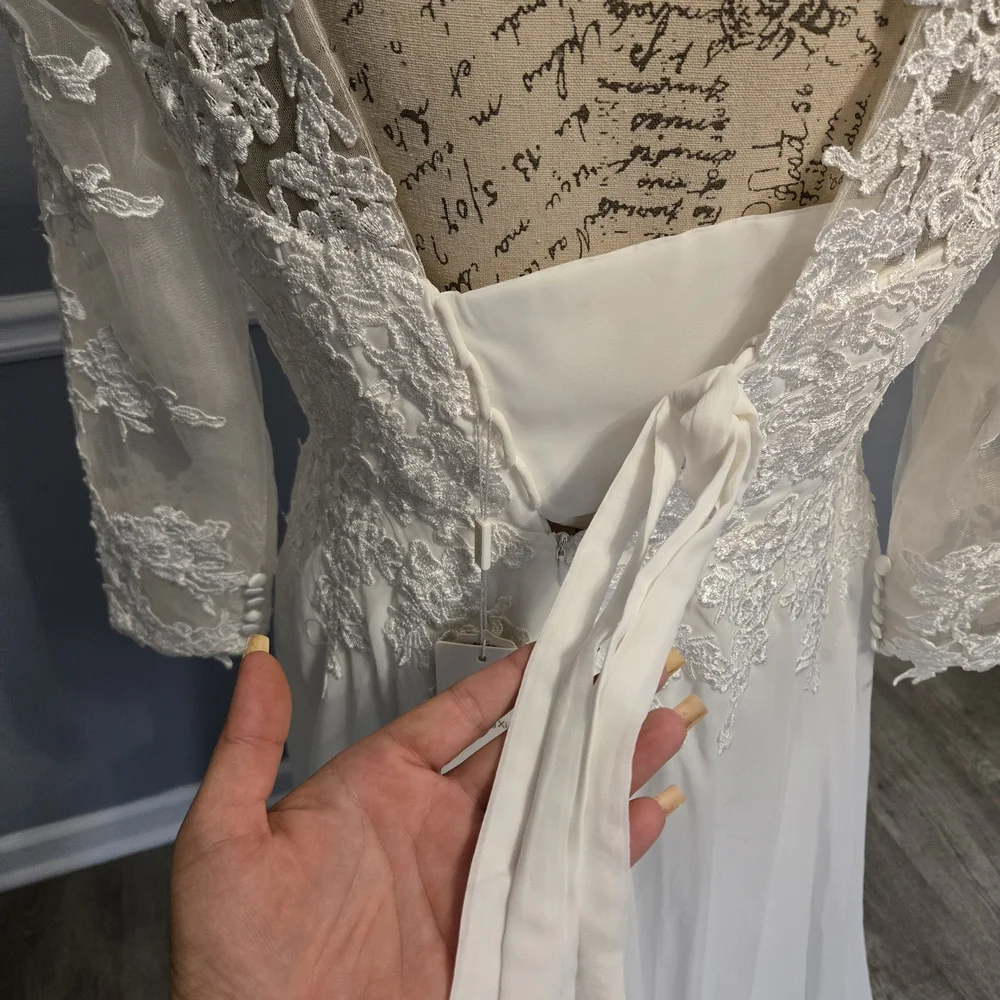 Elegant White Lace Wedding Dress - Picture 6 of 9